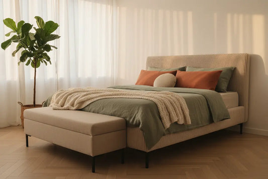 Corduroy queen platform bed with metal legs in a warm, minimalist bedroom
