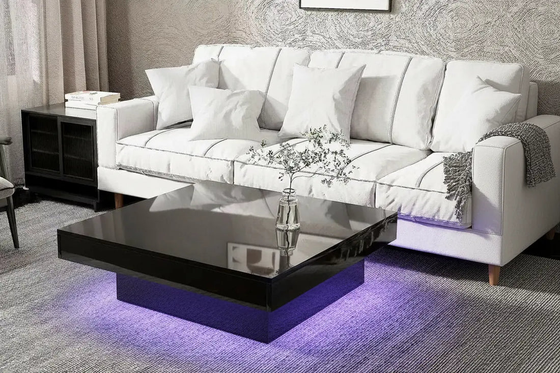 High gloss square coffee table with LED lighting glowing purple in a modern living room